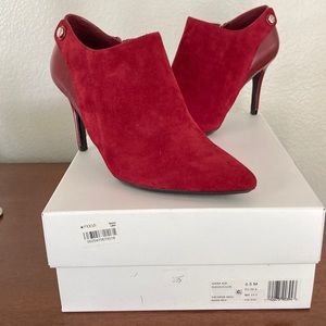 Calvin Klein Women’s Bootie with 3 inch heel.  New in box. Sexy Barn Red.